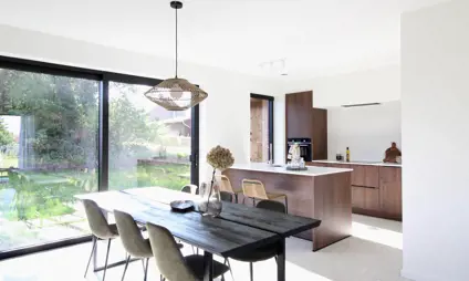 Dining area with open kitchen.