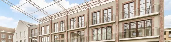 woningen in Tienen - stadswoningen met stadstuin aan een groene zone vooraan