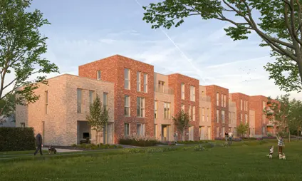 Wijnegem Ertbrugge woningen tuin gras blauwe lucht bomen warme buurt