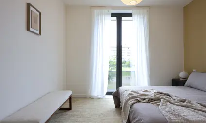 Deurne Eksterlaer Kijkappartement slaapkamer raam tapijt appartement