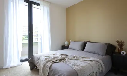 Deurne Eksterlaer Kijkappartement slaapkamer raam tapijt