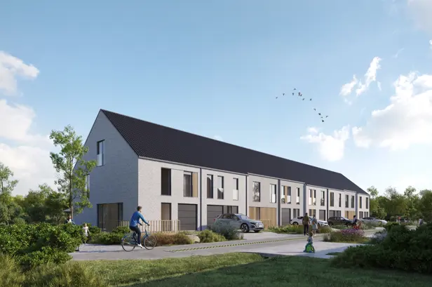 woningen kessel-lo halfopen en gesloten bebouwingen met zadeldak, moderne maar tijdloze architectuur in een lichte gevelsteen, donker dak en houten sierelementen in de gevel