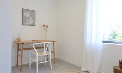 Deurne Eksterlaer Kijkappartement slaapkamer raam tapijt bureau