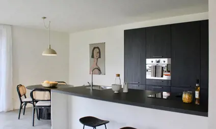 Spacious kitchen with dining area in the apartment in Zonhoven.