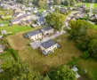 bouwgrond Houthalen tenrijt omgeven door groen in een kleine verkaveling