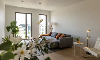 Large living room at level with panoramic view of the city of Hasselt.
